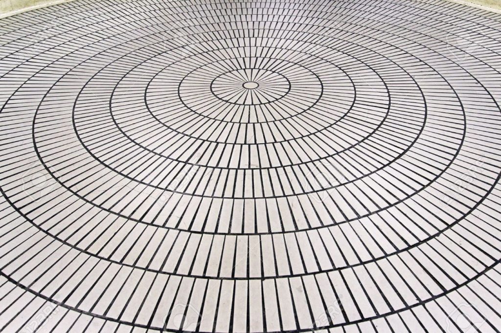 Floor ceramic tiles in concentric circles formation